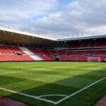 A view of an empty pitch at the Stadium of Light with no writing on the stands