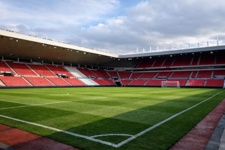 A view of an empty pitch at the Stadium of Light with no writing on the stands