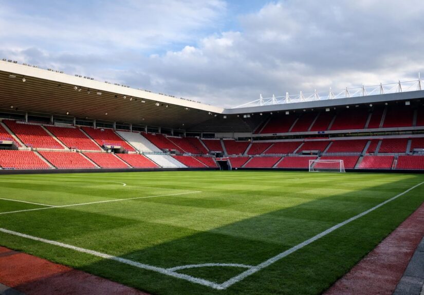 A view of an empty pitch at the Stadium of Light with no writing on the stands