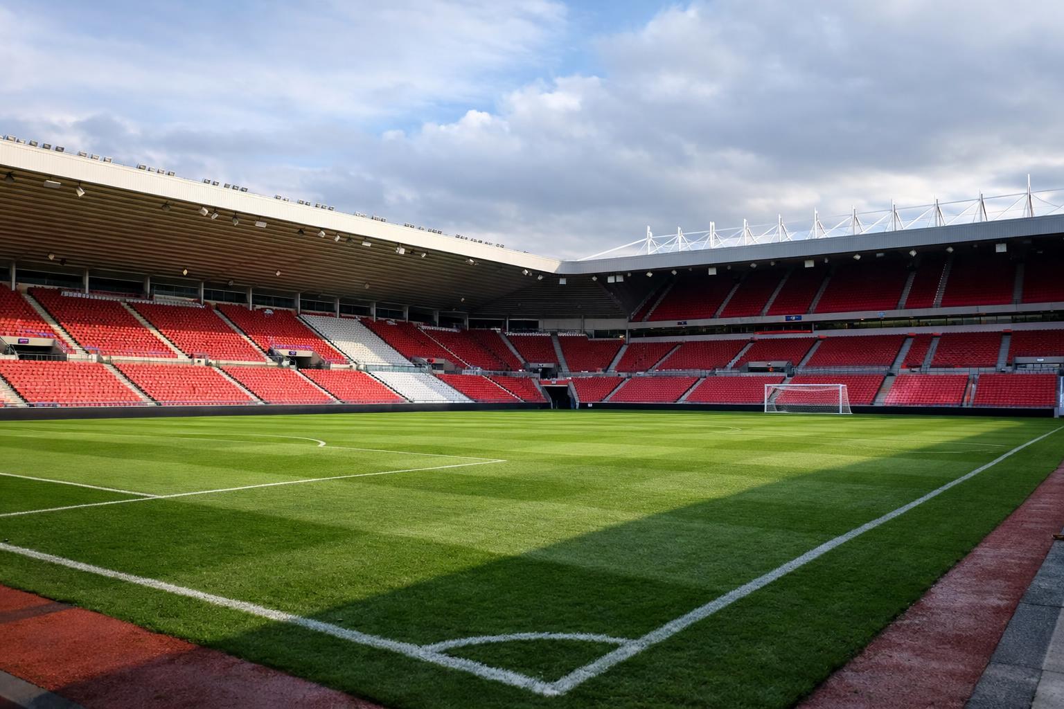A view of an empty pitch at the Stadium of Light with no writing on the stands